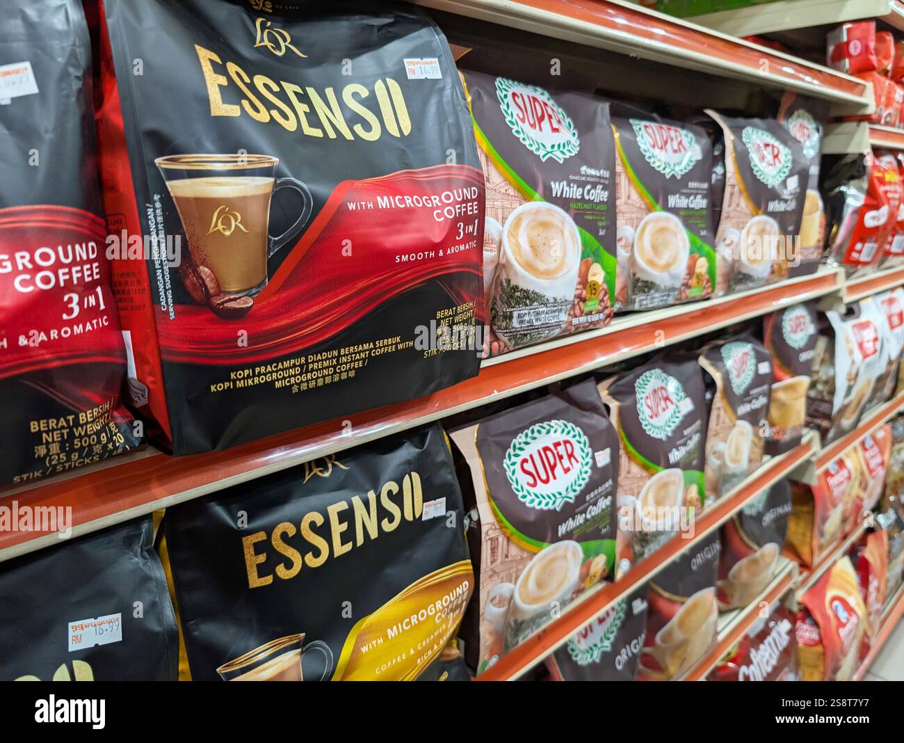 Kota Kinabalu, Malaysia - Jan 20, 2025: Varieties of instant drink on the shelves at 99 Speedmart grocery store. - Smartphone Captured Stock Image
