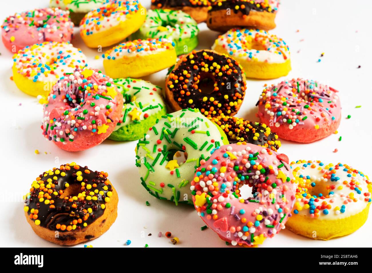 Set of various colorful donuts isolated on white background. Top view ...