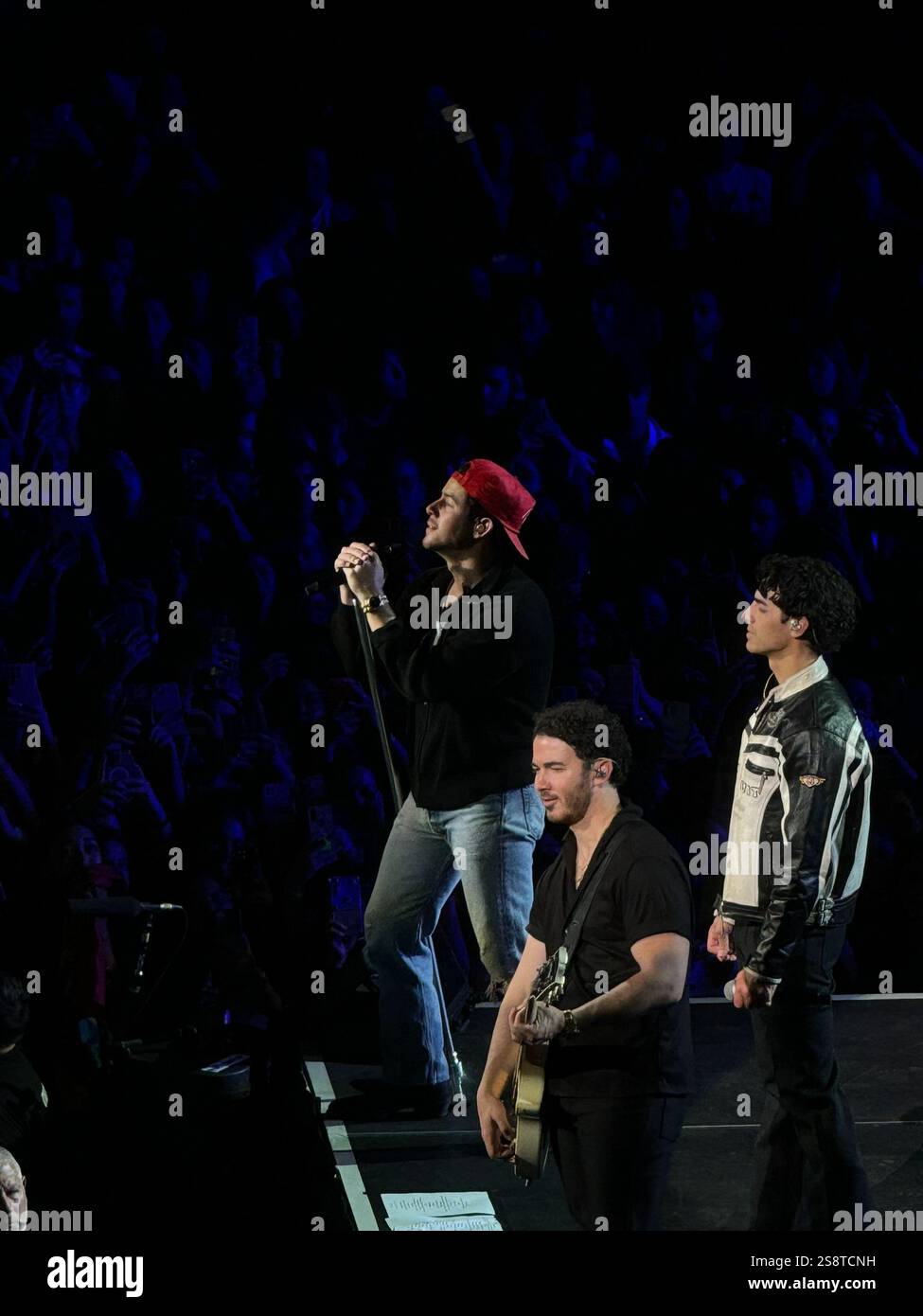 Jonas Brothers performing live in Argentina - Smartphone Captured Stock Image