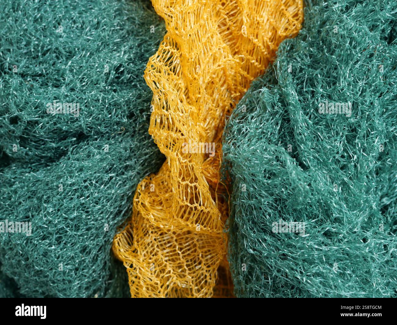 Vegetable nets old and used. The rough texture and tones make it a ...