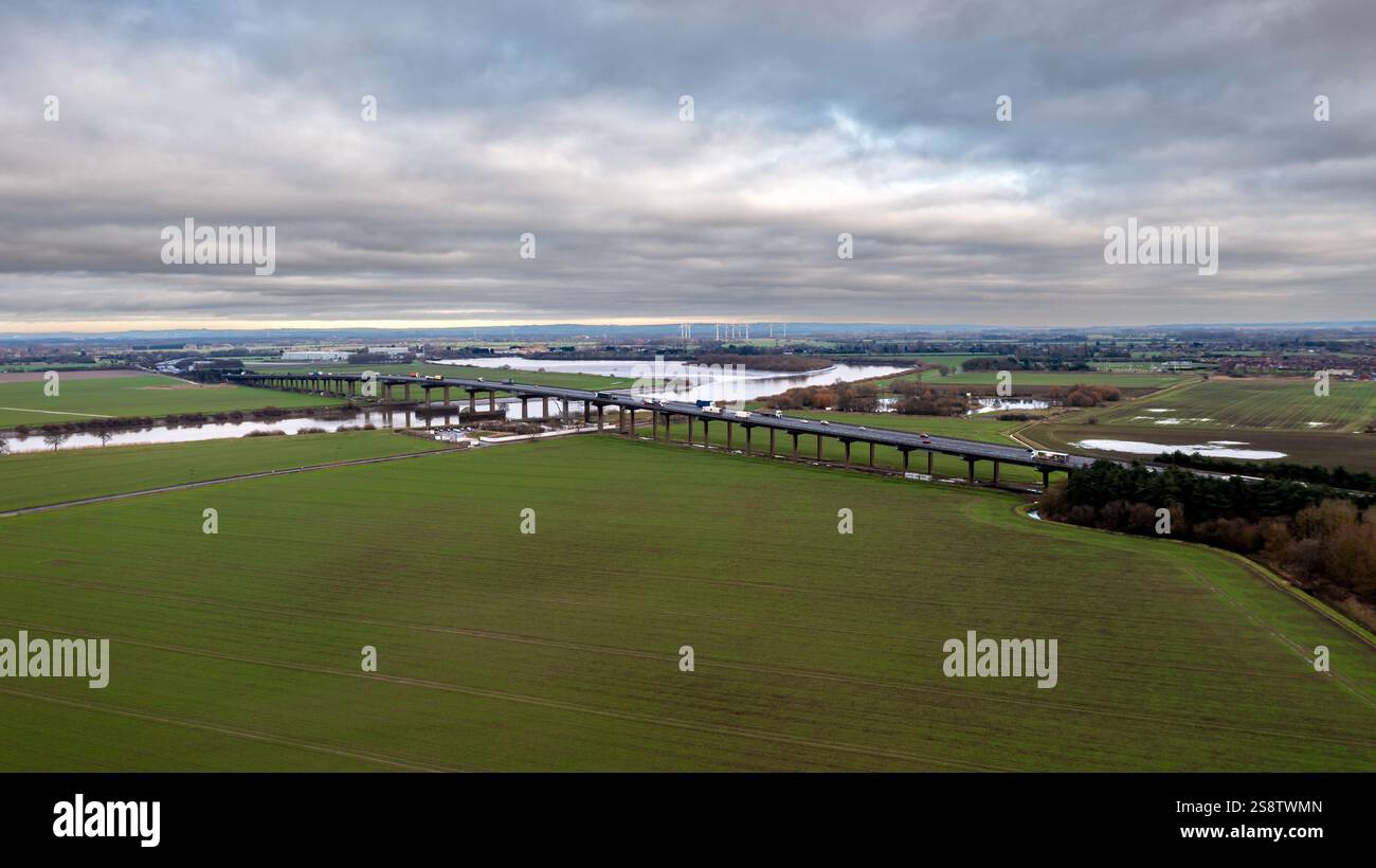 Aerial panoramic view of the Ouse bridge in the East Riding of Yorkshire which carries the M62 motorway over the River Ouse between Goole and Howden. Stock Photo