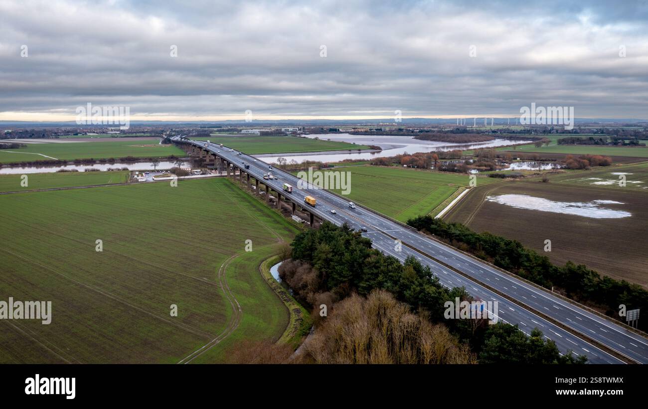 Aerial panoramic view of the Ouse bridge in the East Riding of Yorkshire which carries the M62 motorway over the River Ouse between Goole and Howden. Stock Photo