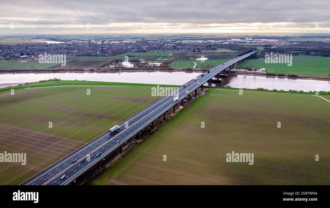 Aerial panoramic view of the Ouse bridge in the East Riding of Yorkshire which carries the M62 motorway over the River Ouse between Goole and Howden. Stock Photo
