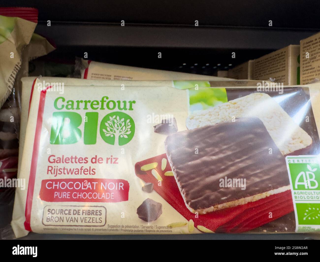 Crispy chocolate rice cakes from organic brand on grocery store shelf Stock Photo