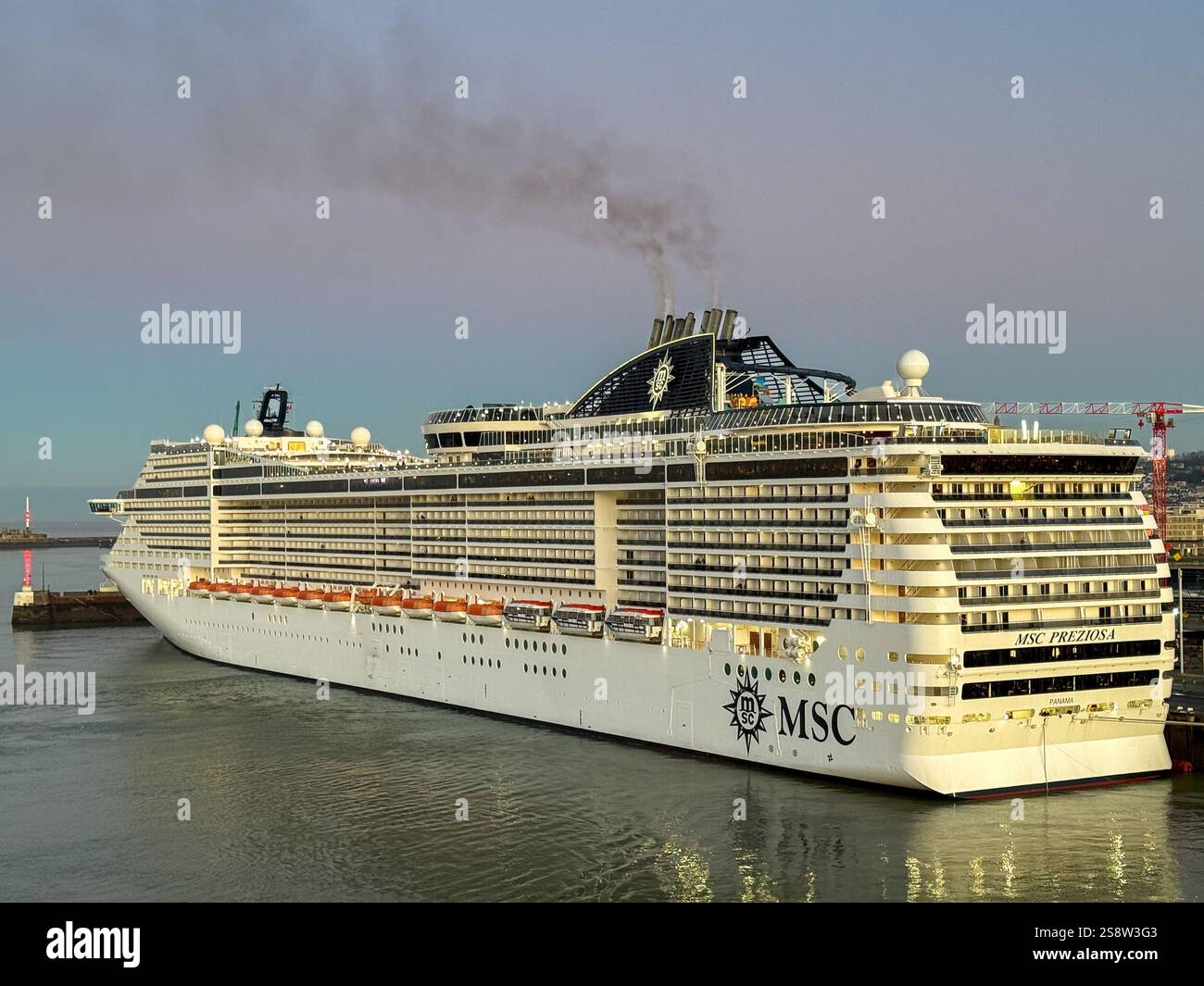 Le Havre, France, Europe - 4 January 2025: Cruise ship MSC Preziosa docked in the port of Le Havre in early morning light - Smartphone Captured Stock Image Le Havre, France, Europe - 4 January 2025: Cruise ship MSC Preziosa docked in the port of Le Havre in early morning light - Smartphone Captured Stock Image