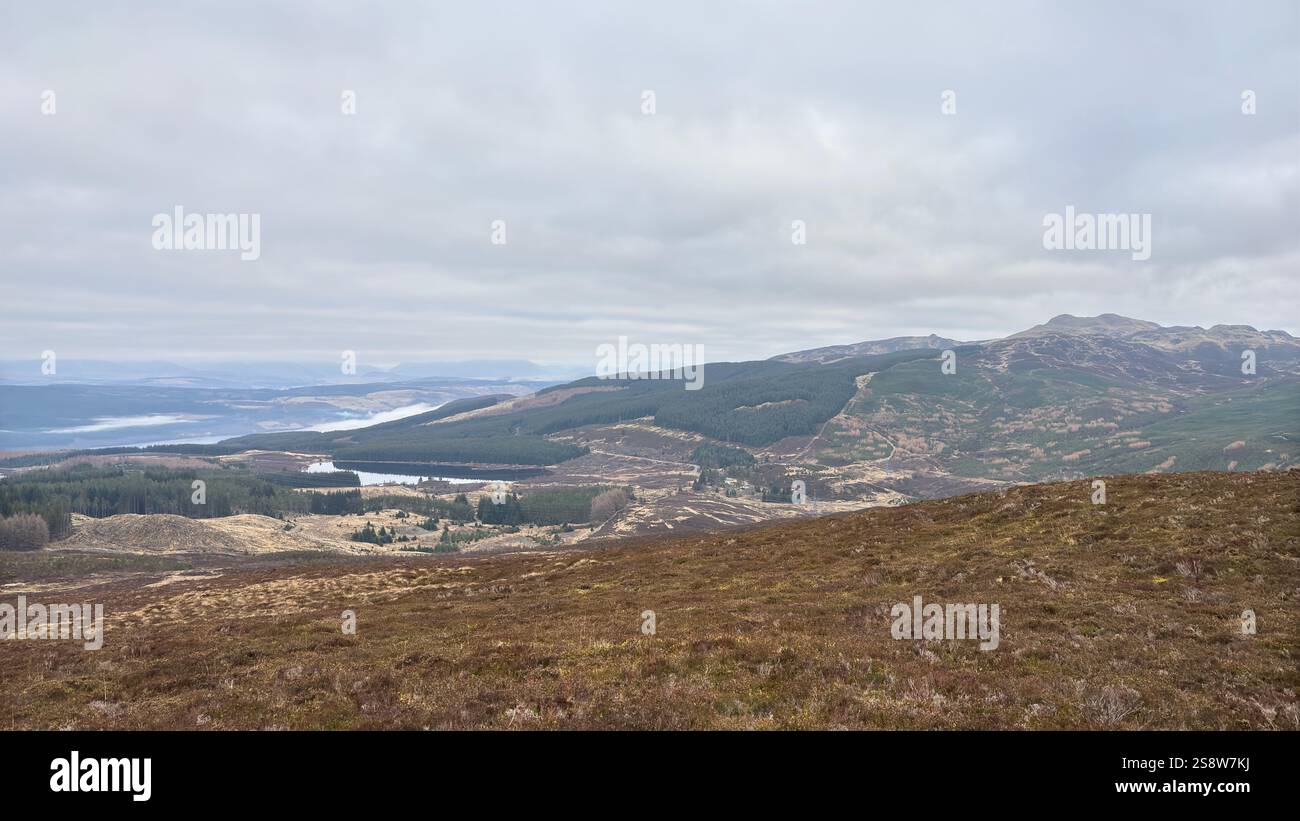 Dun Coillich hill and glen around Glengoulandie in the Scottish Highlands. Perthshire. Rolling Scottish countryside and mountain views with heather, r - Smartphone Captured Stock Image