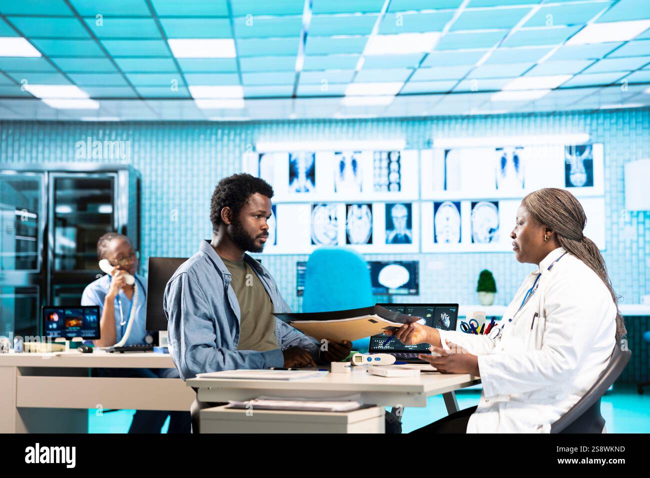 African american doctor and patient having in depth conversation about ...