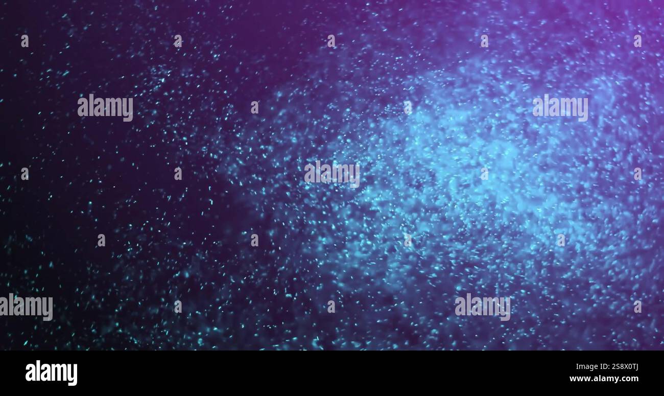 Image of glowing spots of light moving over dark background Stock Photo