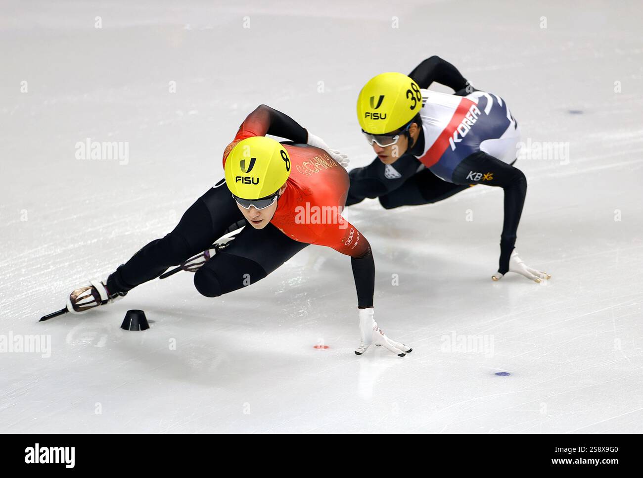 Turin, Italy. 23rd Jan, 2025. Zhang Tianyi (L) of Team China and Kim ...