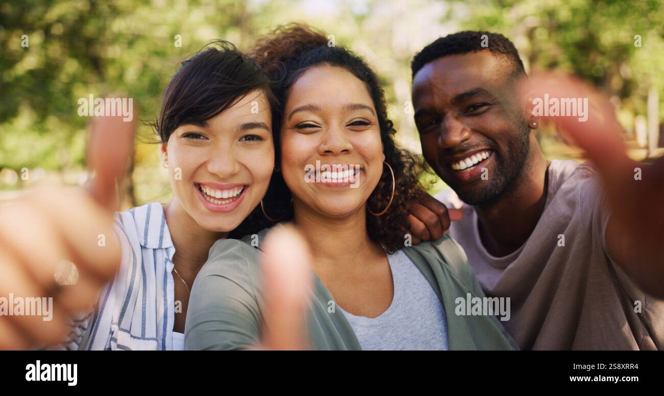 Portrait, thumbs up and group of friends in park with smile, support or ...