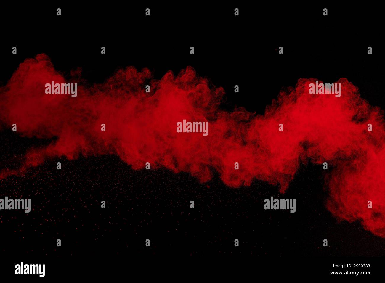 Abstract red powder dust explosion on black background. Stock Photo