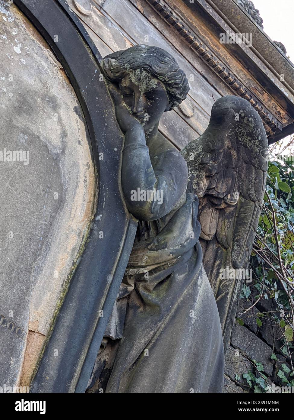 Guardian Angel Stone Grave Marker in Cemetery Scotland - Smartphone Captured Stock Image