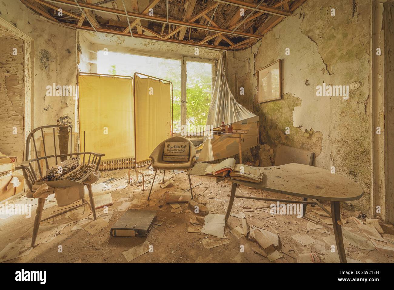 Table Crumbling A messy room with various chairs and a table under a crumbling ceiling ...