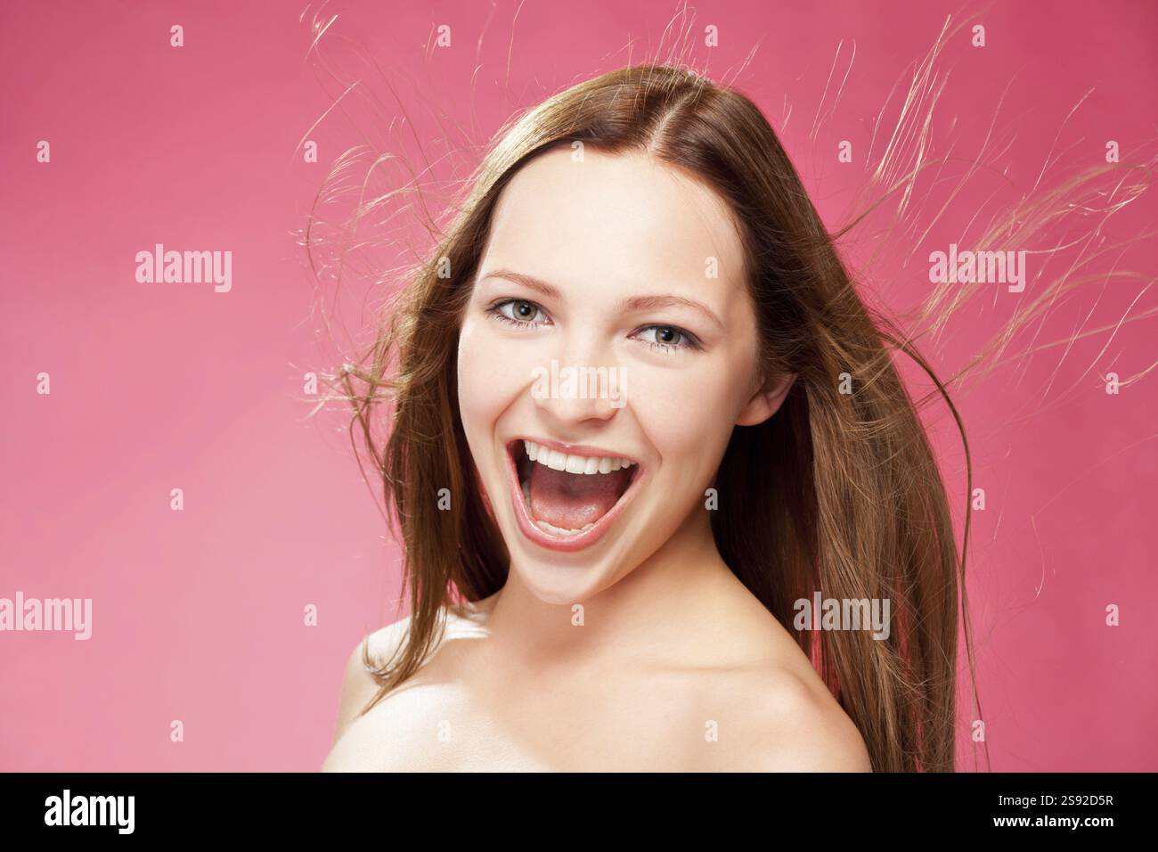Attractive young woman close-up studio portrait Stock Photo