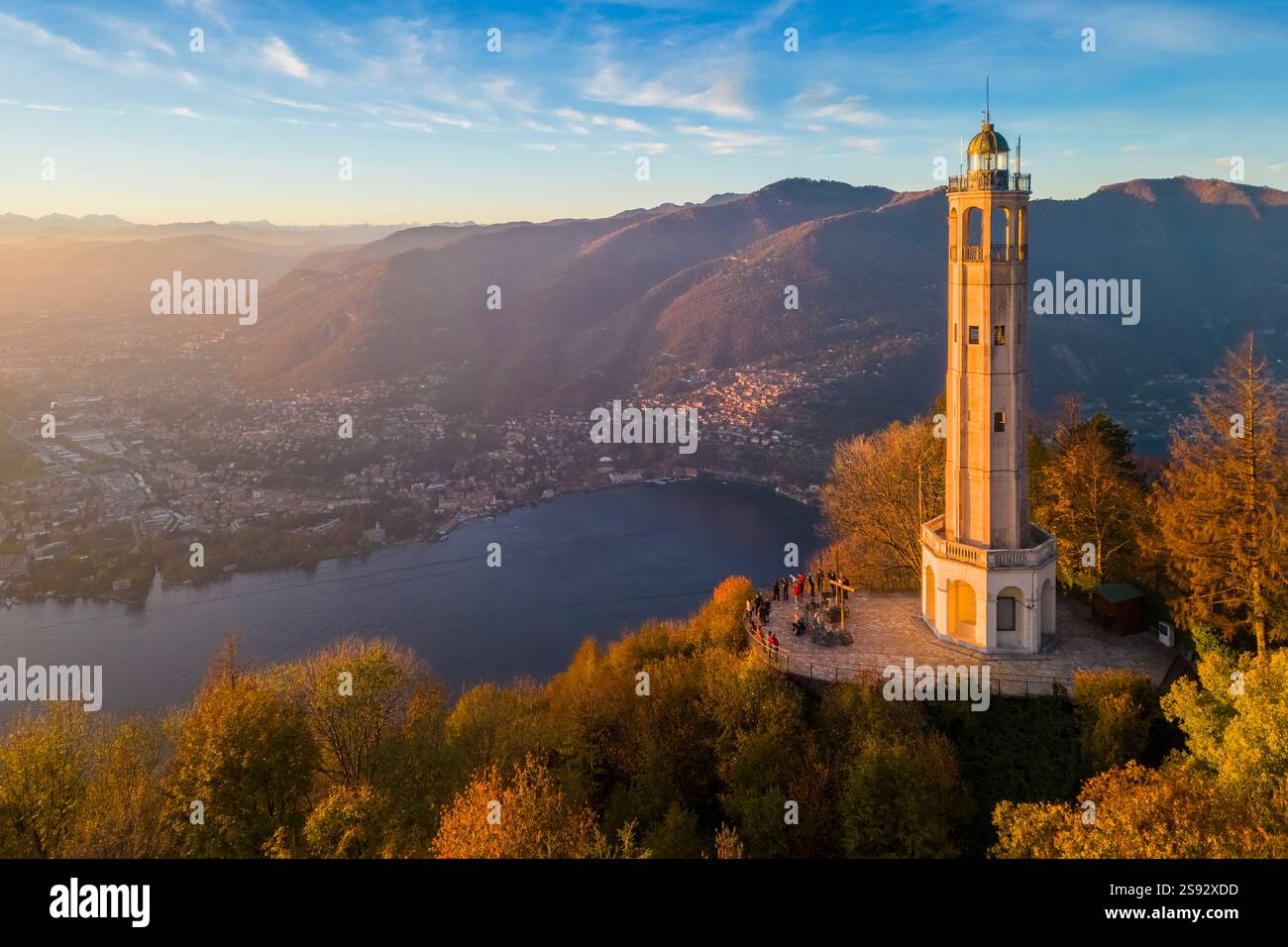 Aerial view of the Faro Voltiano (Volta Lighthouse) of Brunate overlooking Como and Como Lake in autumn. Brunate, Province of Como, Lombardy, Italy. Stock Photo