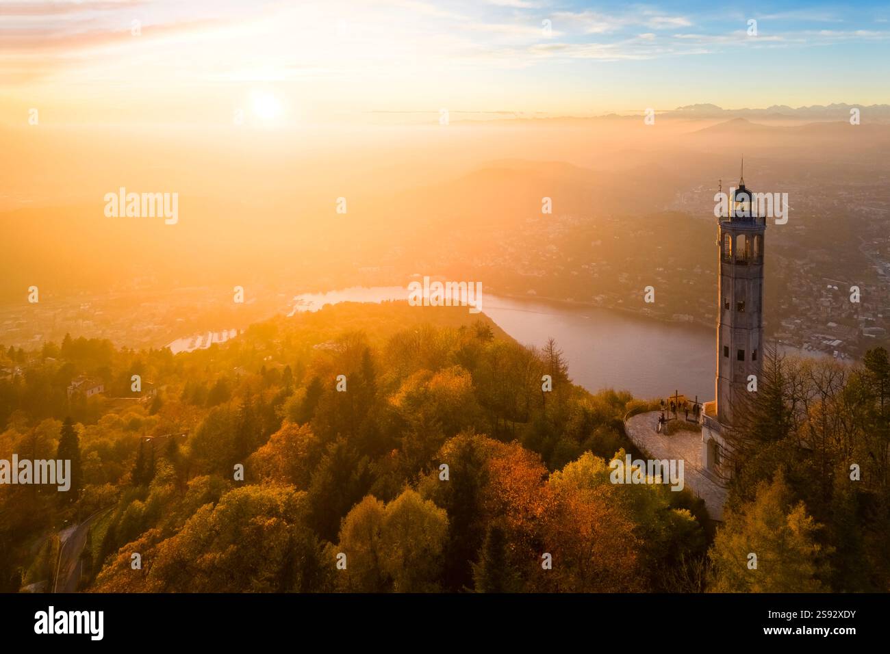 Aerial view of the Faro Voltiano (Volta Lighthouse) of Brunate overlooking Como and Como Lake in autumn. Brunate, Province of Como, Lombardy, Italy. Stock Photo