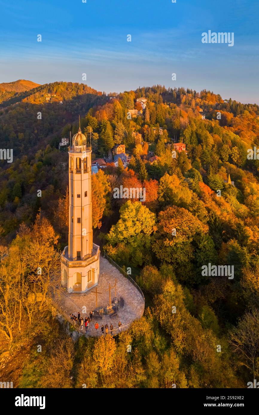 Aerial view of the Faro Voltiano (Volta Lighthouse) of Brunate overlooking Como and Como Lake in autumn. Brunate, Province of Como, Lombardy, Italy. Stock Photo