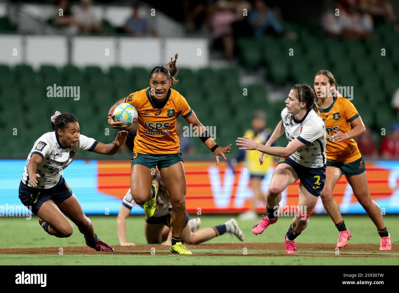 Faith Family Rugby Faith Nathan of Australia runs in for a try against Spain during the ...