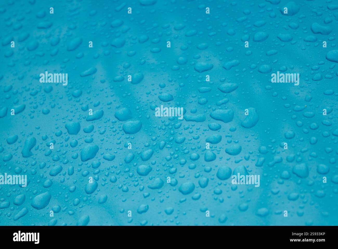panorama water drops on blue background Stock Photo