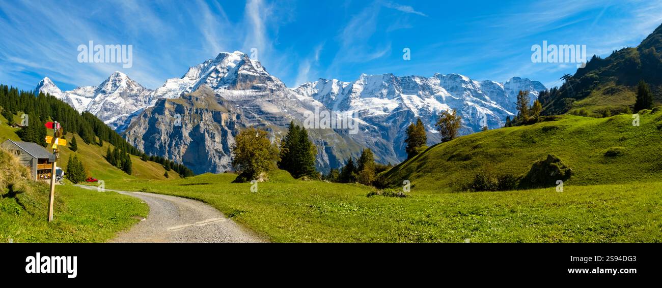 Traditional alpine village in touristic valley Lauterbrunnen ...