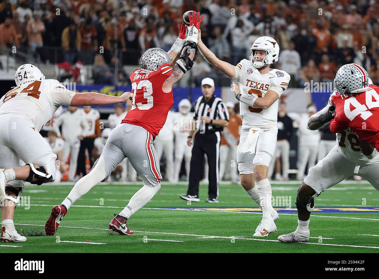 Ohio State defensive end Jack Sawyer (33) pressures Texas quarterback