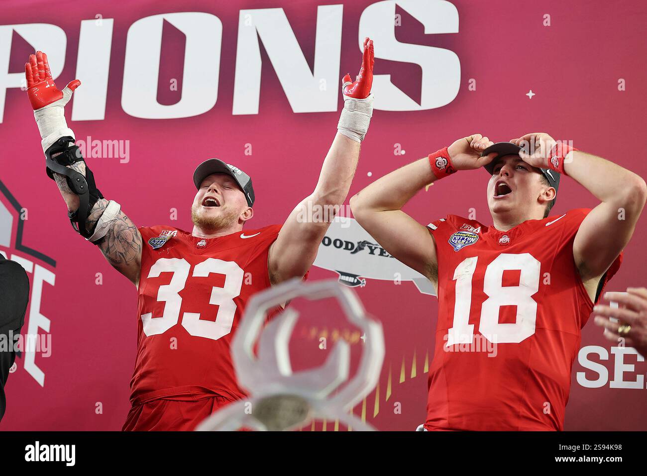 Ohio State defensive end Jack Sawyer (33) and quarterback Will Howard
