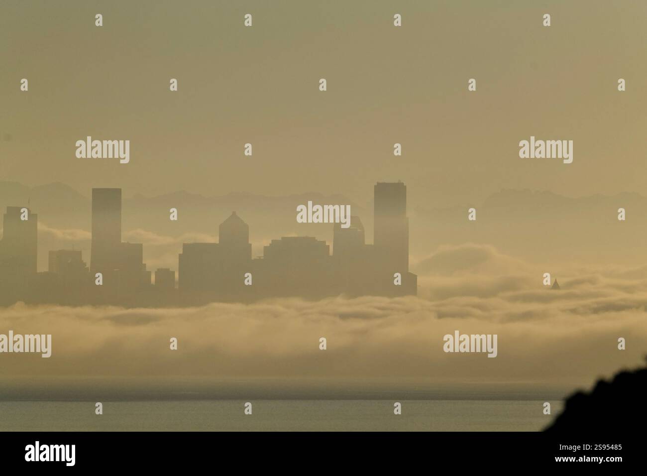 The skyscrapers and Space Needle of Seattle rising above the Puget ...
