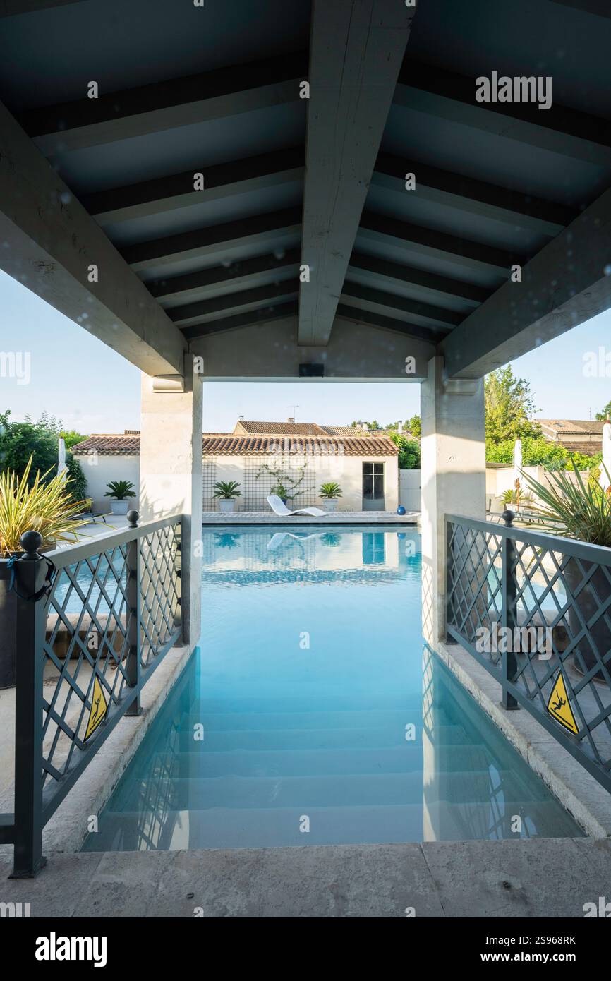 Covered entrance to a small swimming pool, St. Remy, Provence, France ...