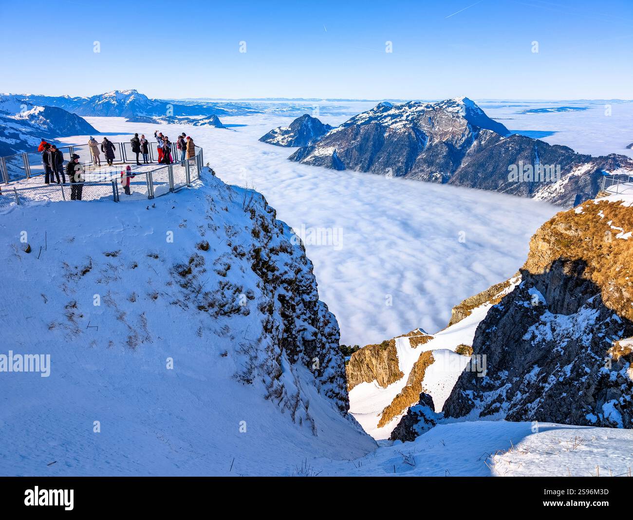 Stoos View Aerial drone view of snow covered mountains and ski slopes, ski area ...