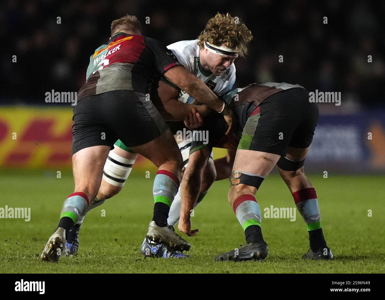 Northampton Saints' Angus ScottYoung tackled by Harlequins' Jack