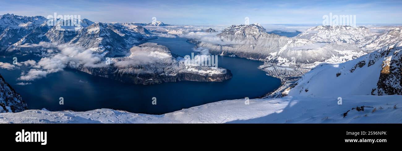 Stoos View Aerial drone view of snow covered mountains and ski slopes, ski area ...