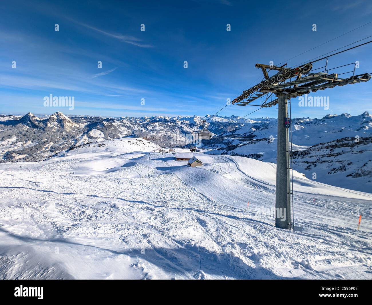 Stoos View Aerial drone view of snow covered mountains and ski slopes, ski area ...
