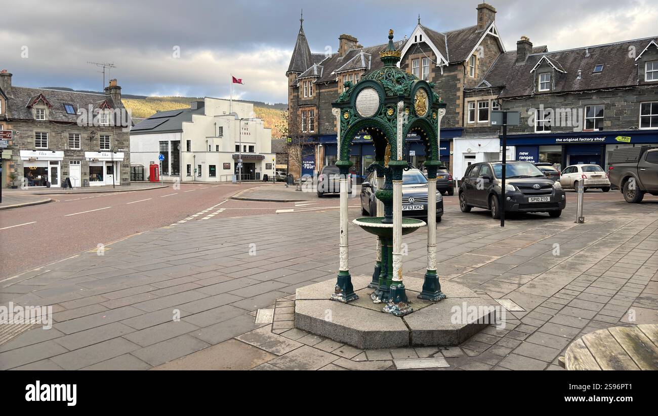Decorative water fountain in the main square of Aberfeldy in Scotland. Victorian decorative street art - Smartphone Captured Stock Image