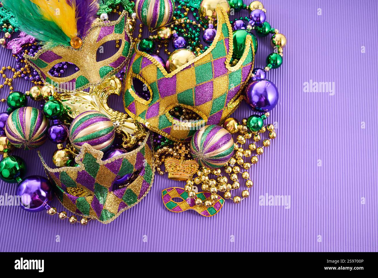 mardi-gras-celebration-colorful-mardi-gras-masks-and-beads-stock-photo