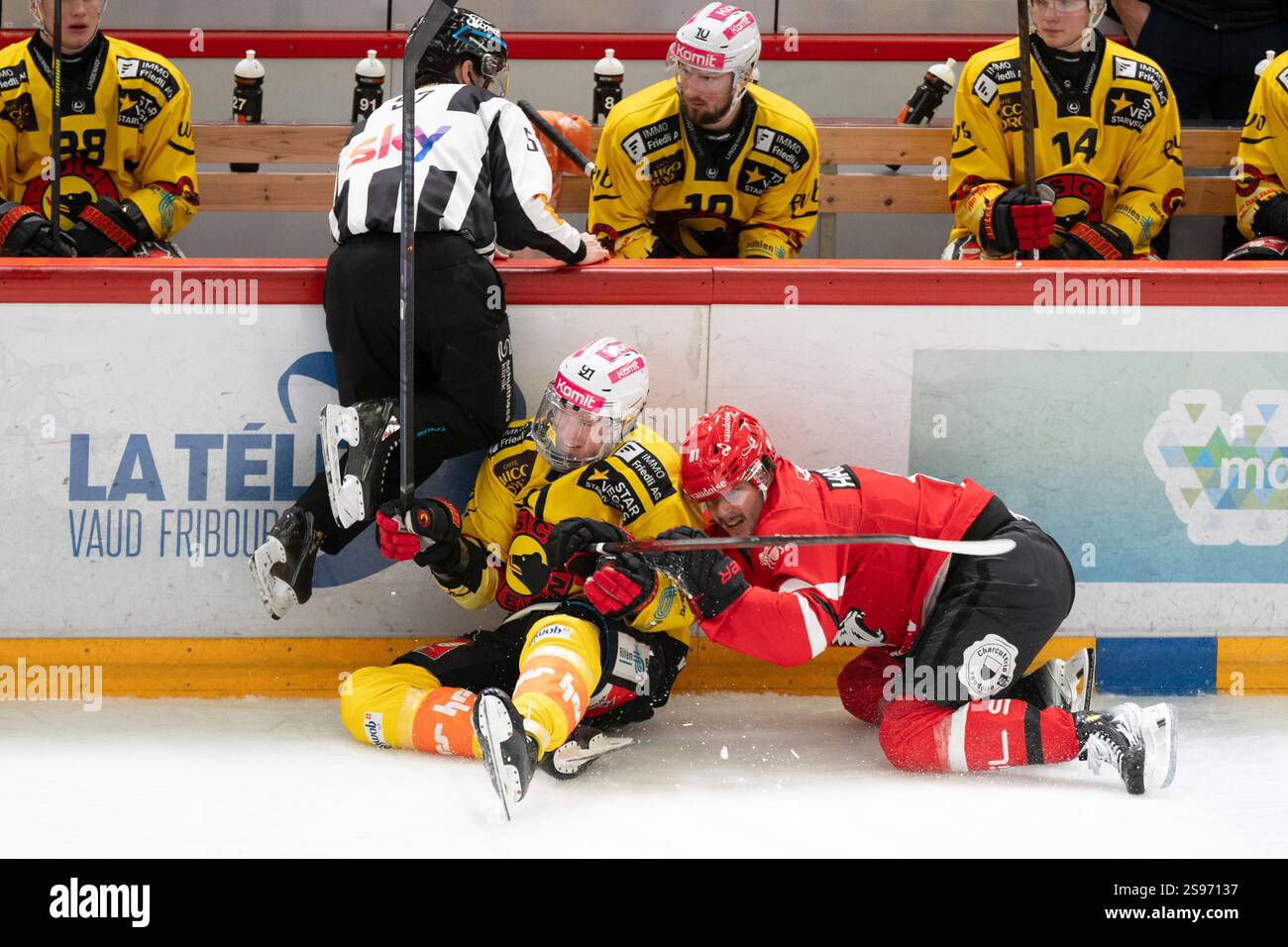 Lausanne Switzerland, 01 24 2025: referee tries to avoid tackle from