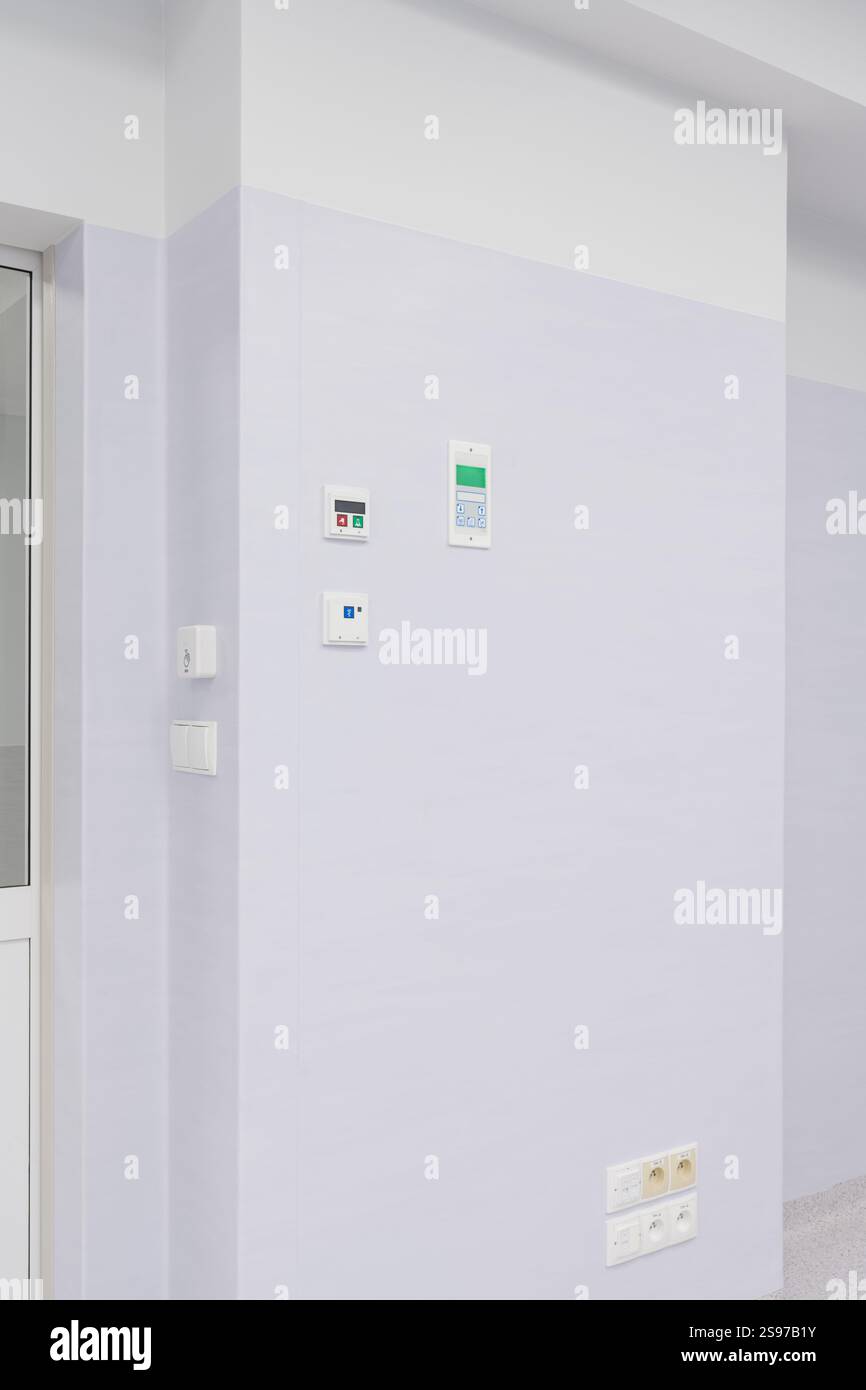 Modern Control Panels and Electrical Outlets on a hospital Wall Stock ...