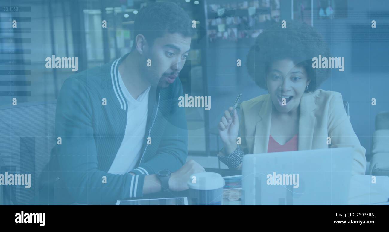 Discussing ideas, two colleagues in office with data processing image over them Stock Photo