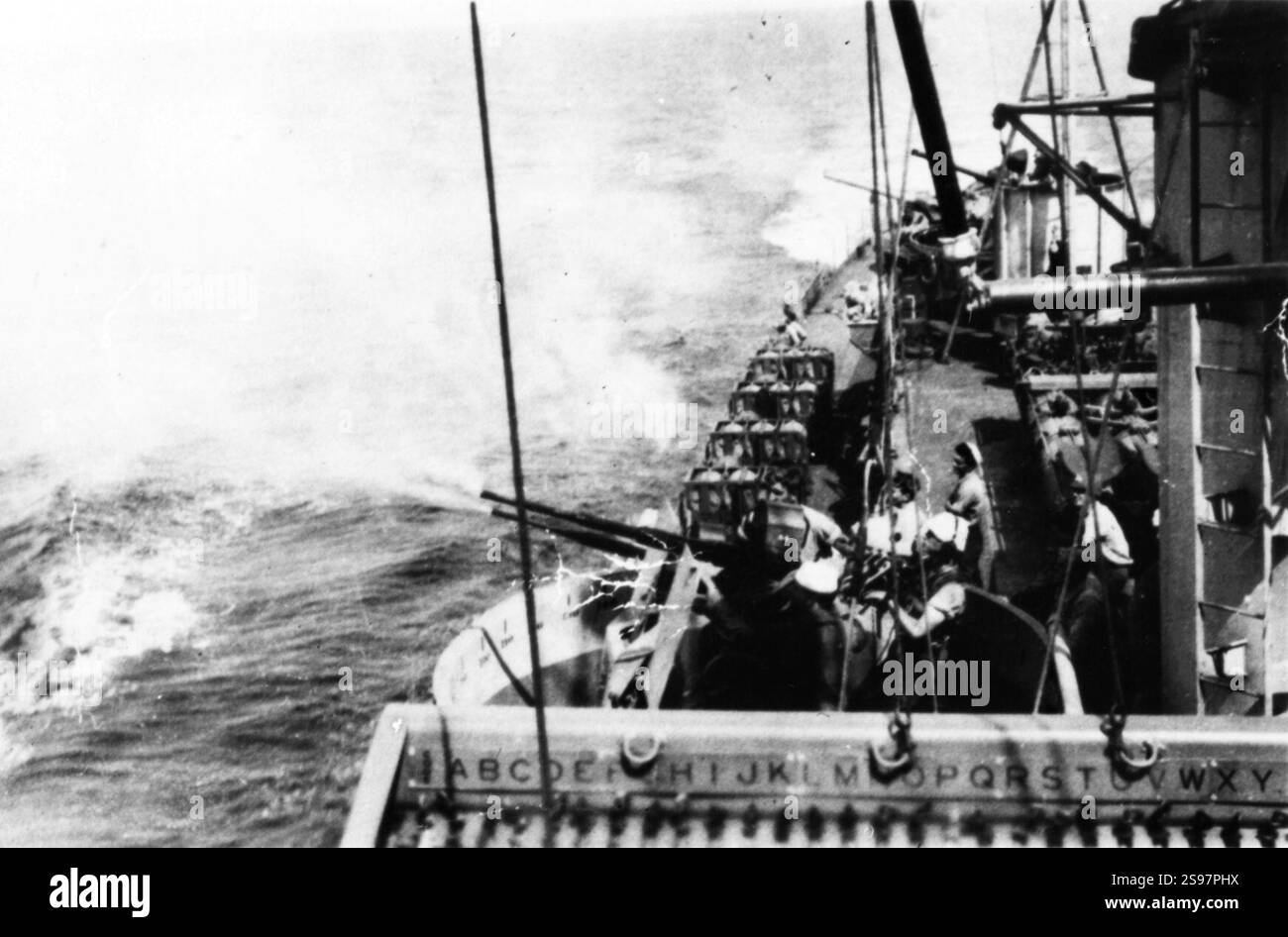 Uss Riley Guns firing aboard USS Riley (DE-579), in 1945 Stock Photo - Alamy