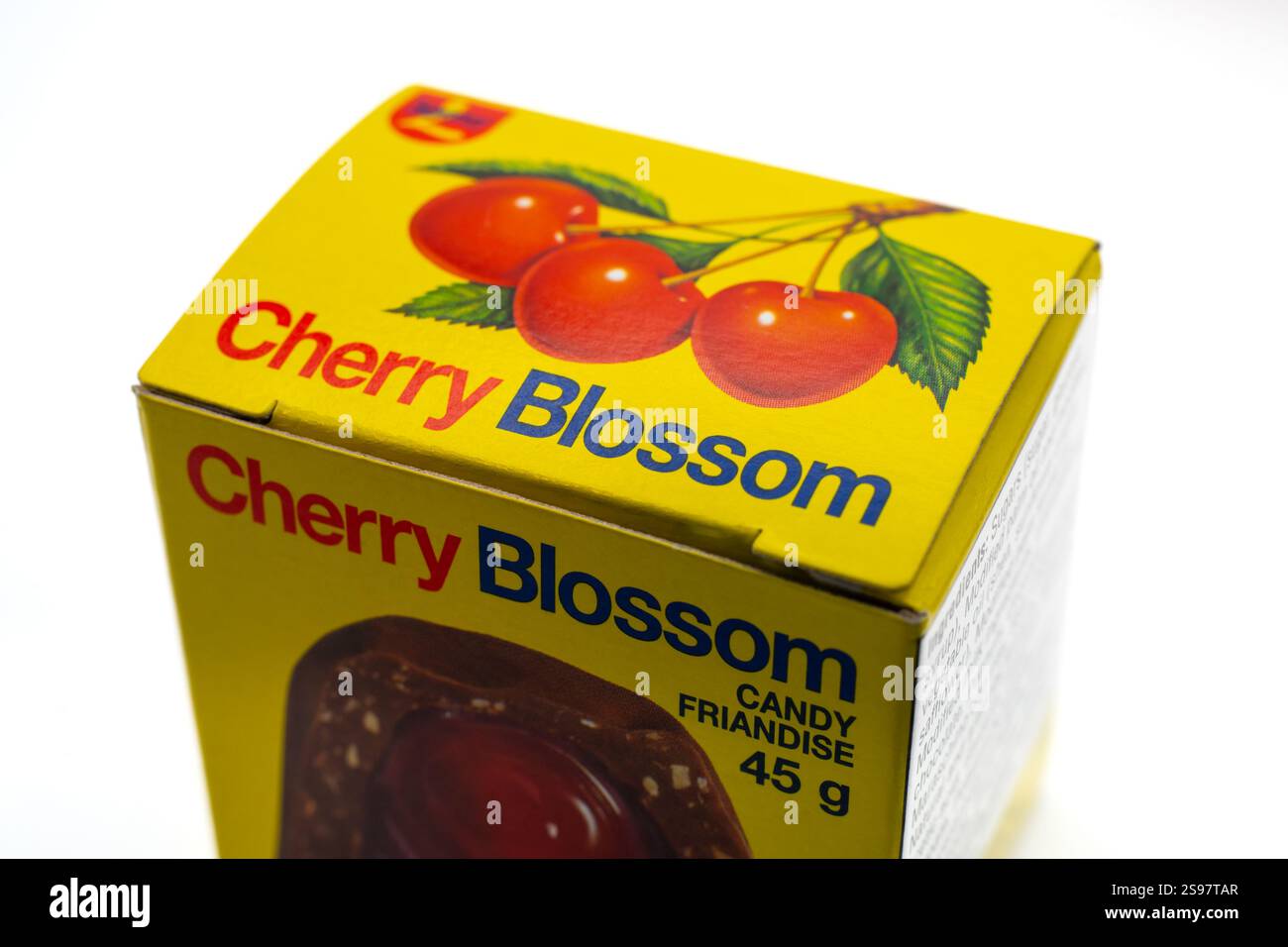 A box of Cherry Blossom candy, featuring vibrant yellow packaging and ...