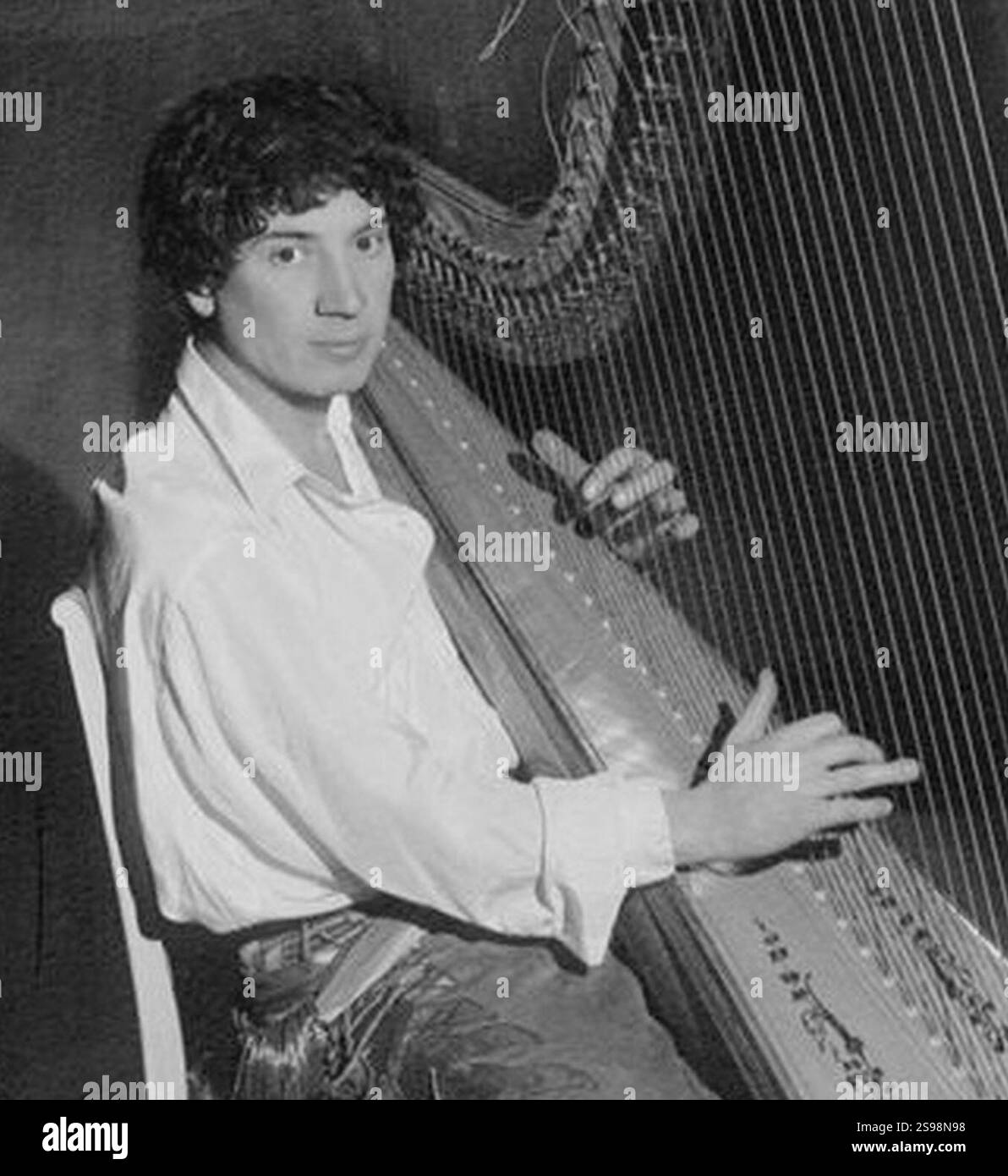 Harpo Marx playing the harp (cropped Stock Photo Alamy