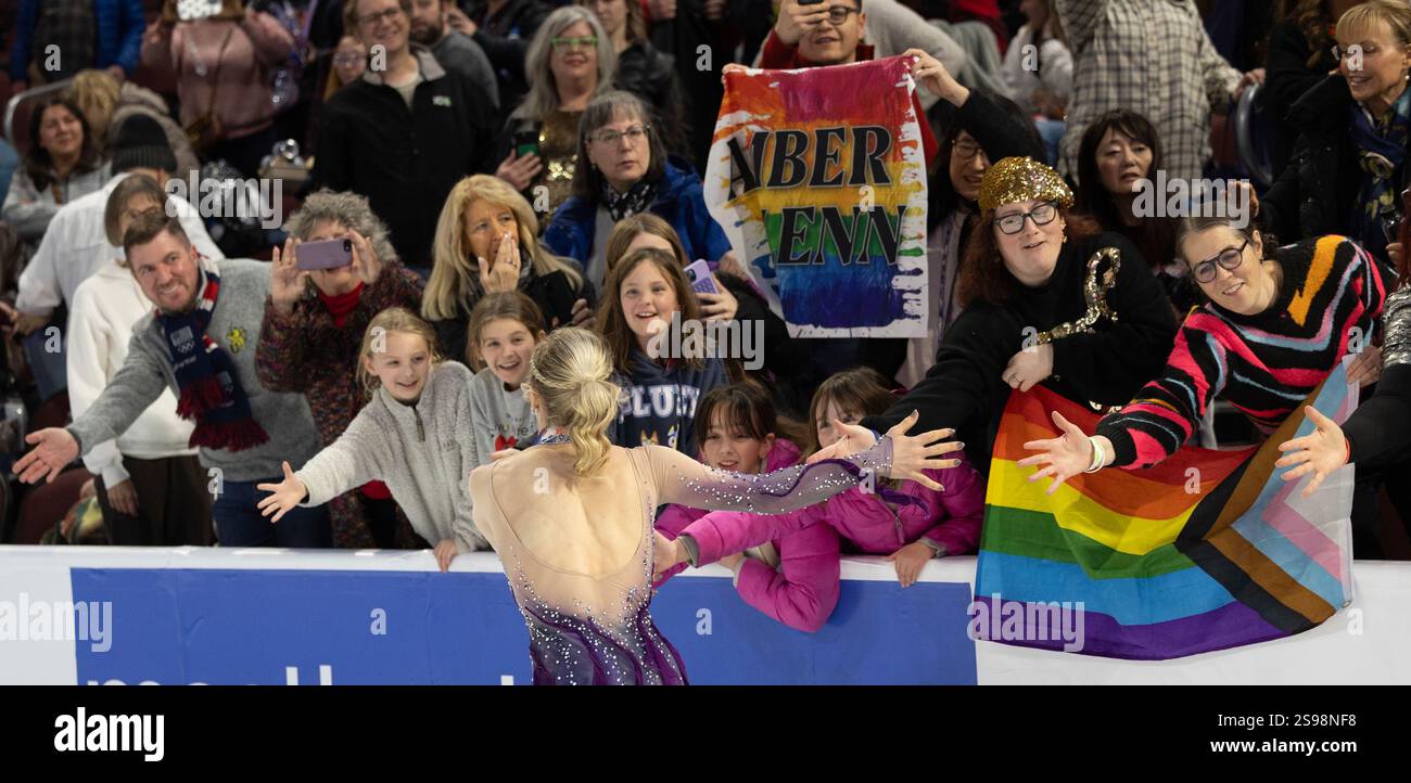 Amber Glenn celebrates with fans after winning the women's competition at the U.S. figure