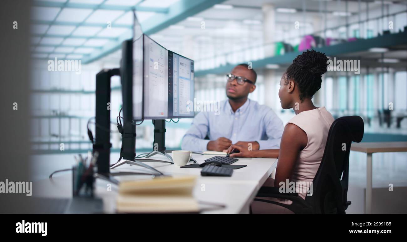 Analyst Working With Spreadsheet Business Data On Computer Stock Photo