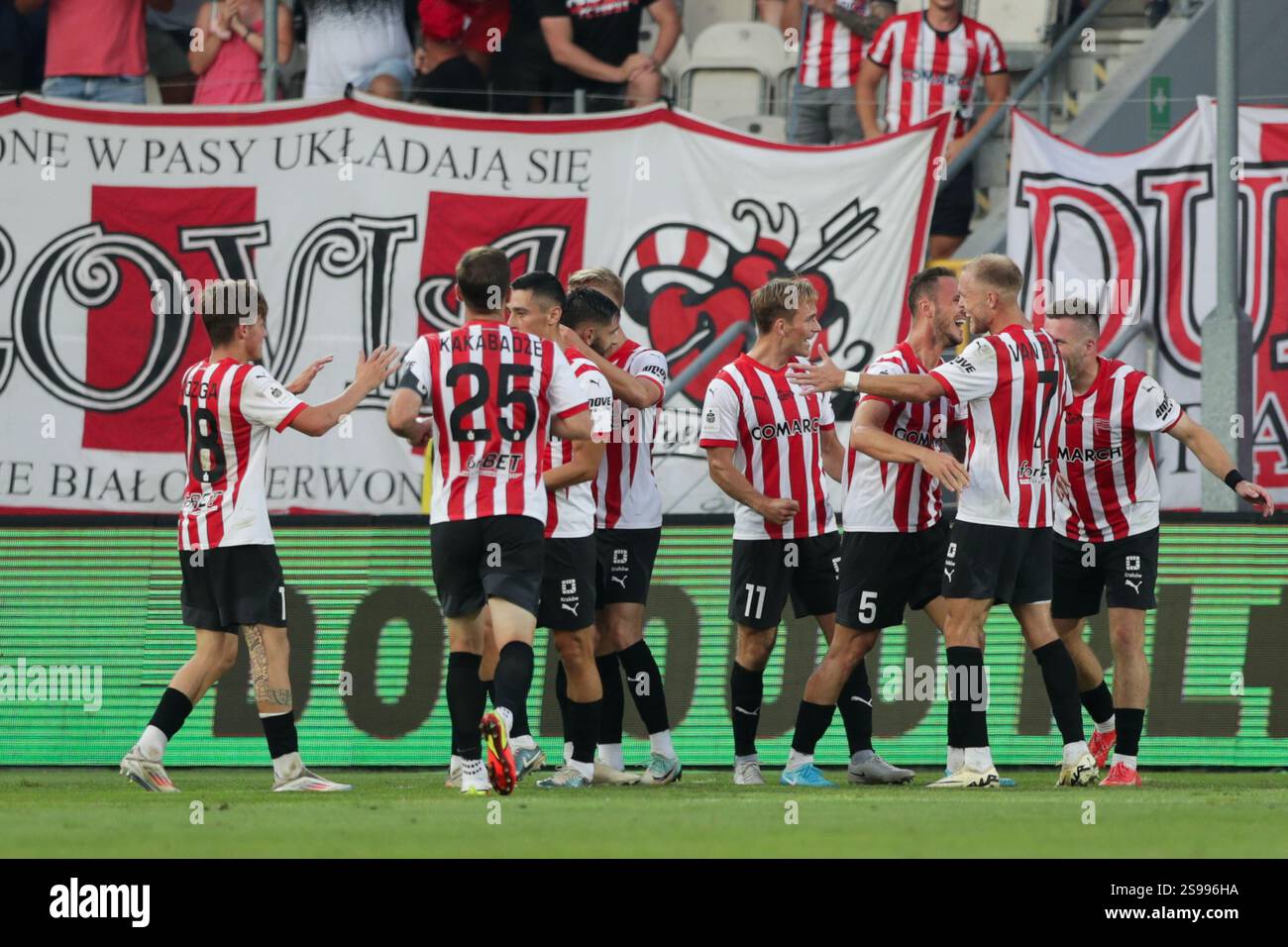 Players of Cracovia Krakow celebrate after scoring a goal during Polish