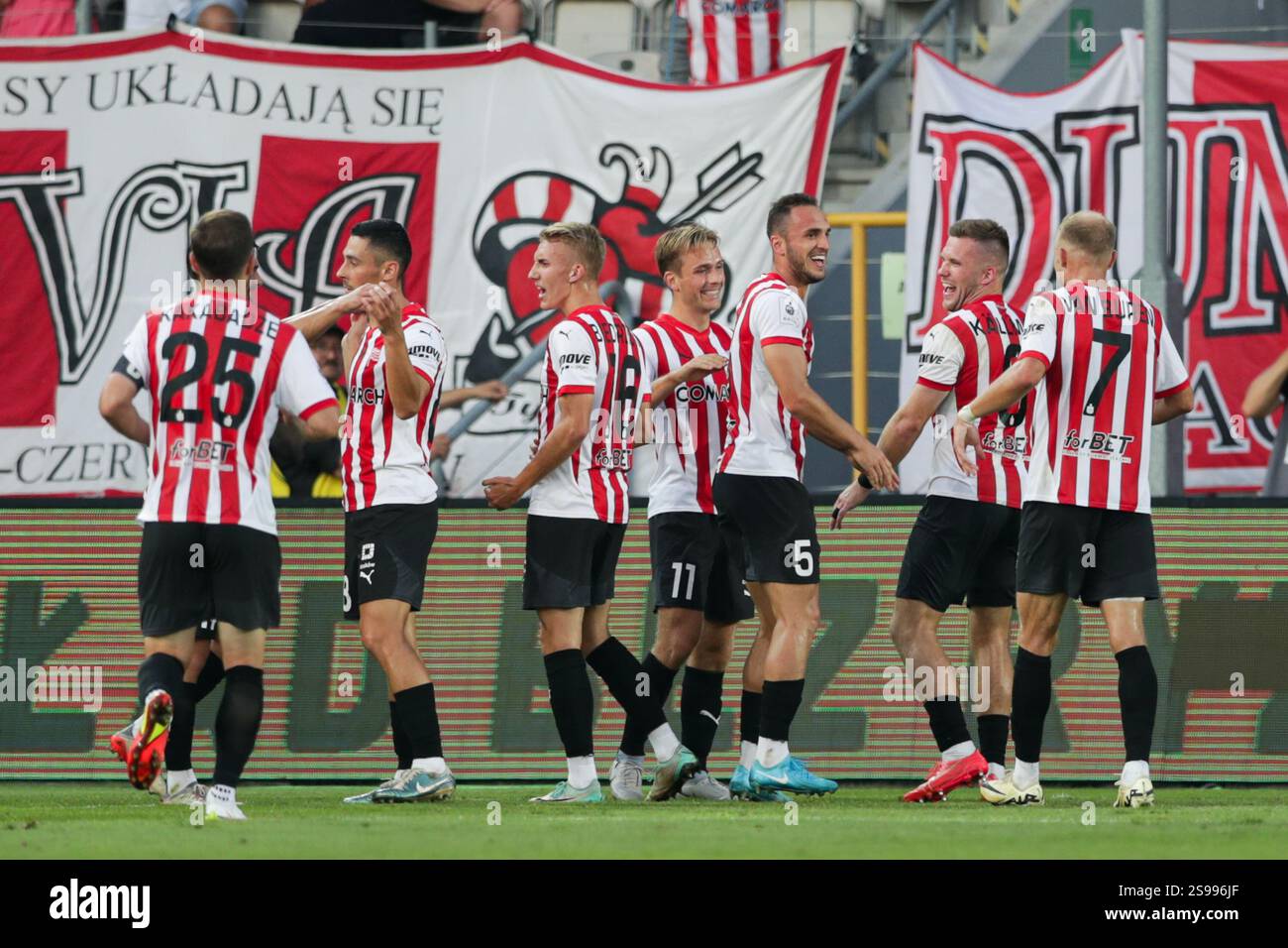 Players of Cracovia Krakow celebrate after scoring a goal during Polish