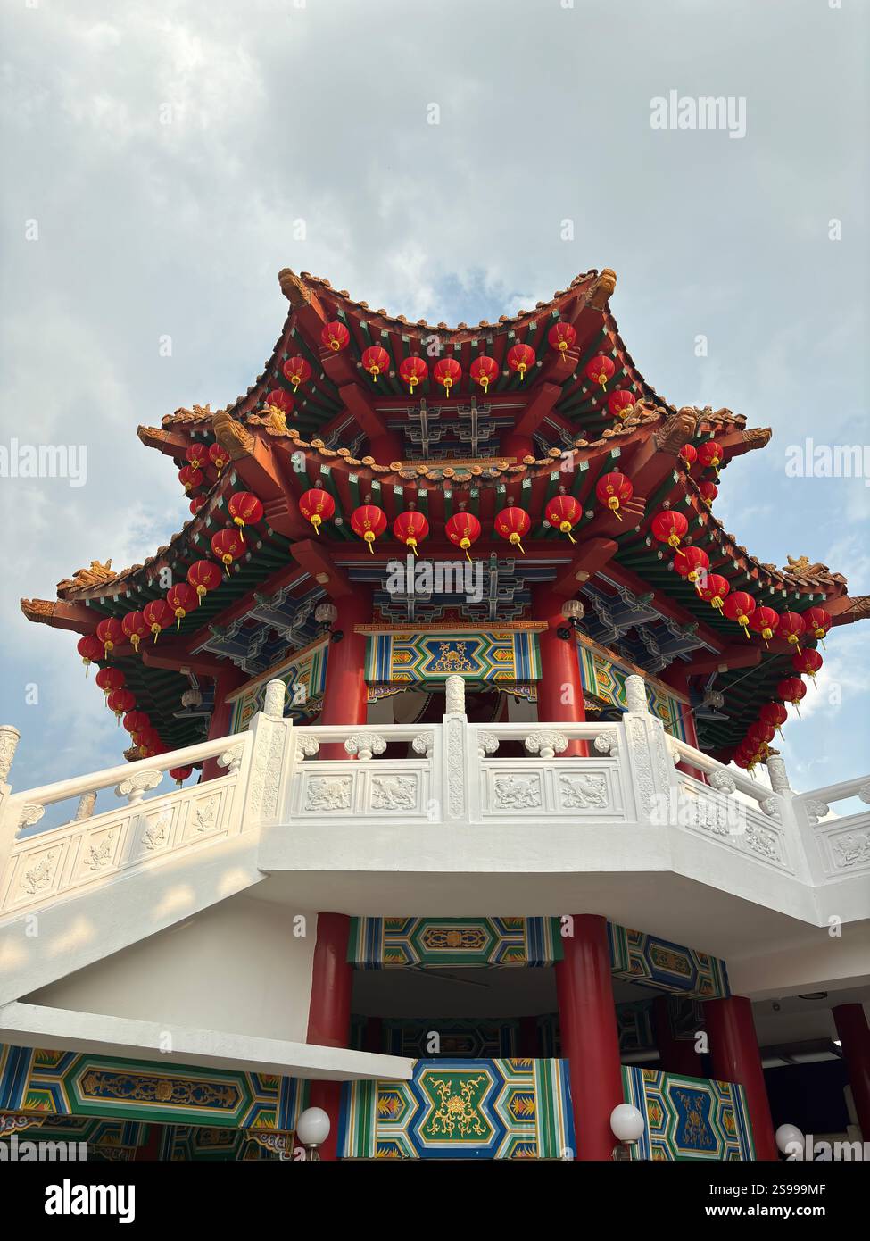A vibrant scene at the Thean Hou Temple during Chinese New Year, with ...