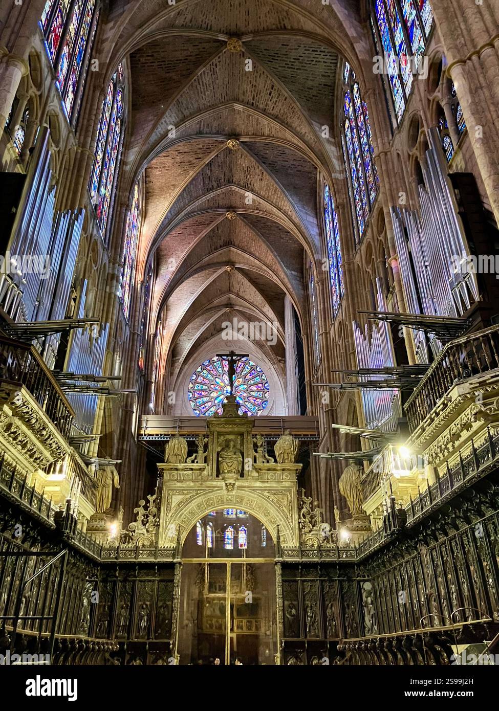 Jesus on the Cross, Crucifix, Vaulted Ceiling and Medieval Glass: Catedral de León, Castille y León, Spain - Smartphone Captured Stock Image