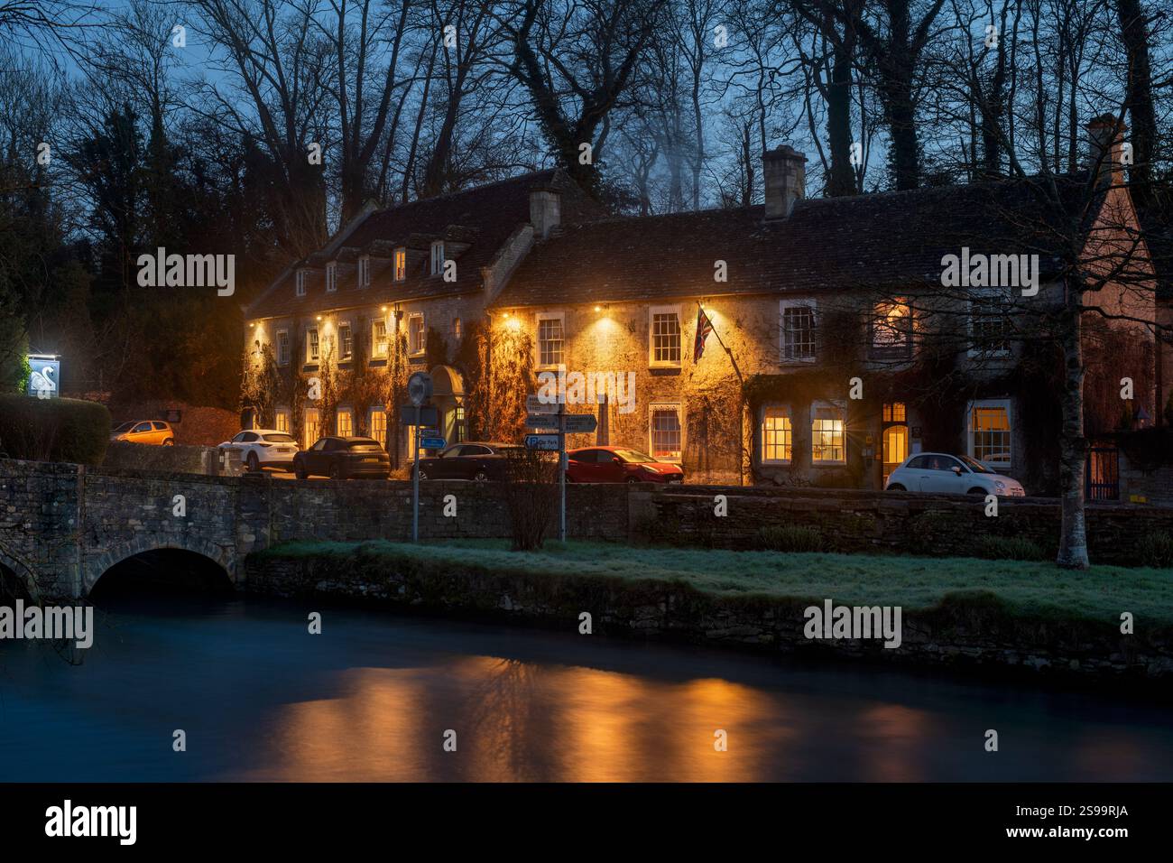 The Swan Hotel at dawn in winter. Bibury, Cotswolds, Gloucestershire, England Stock Photo