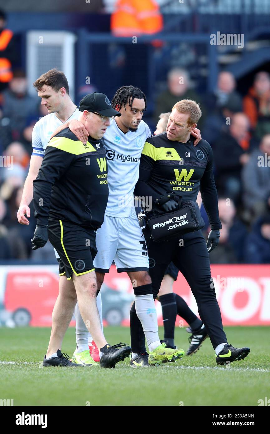 Millwall's Calum Scanlon leaves the field injured during the Sky Bet ...