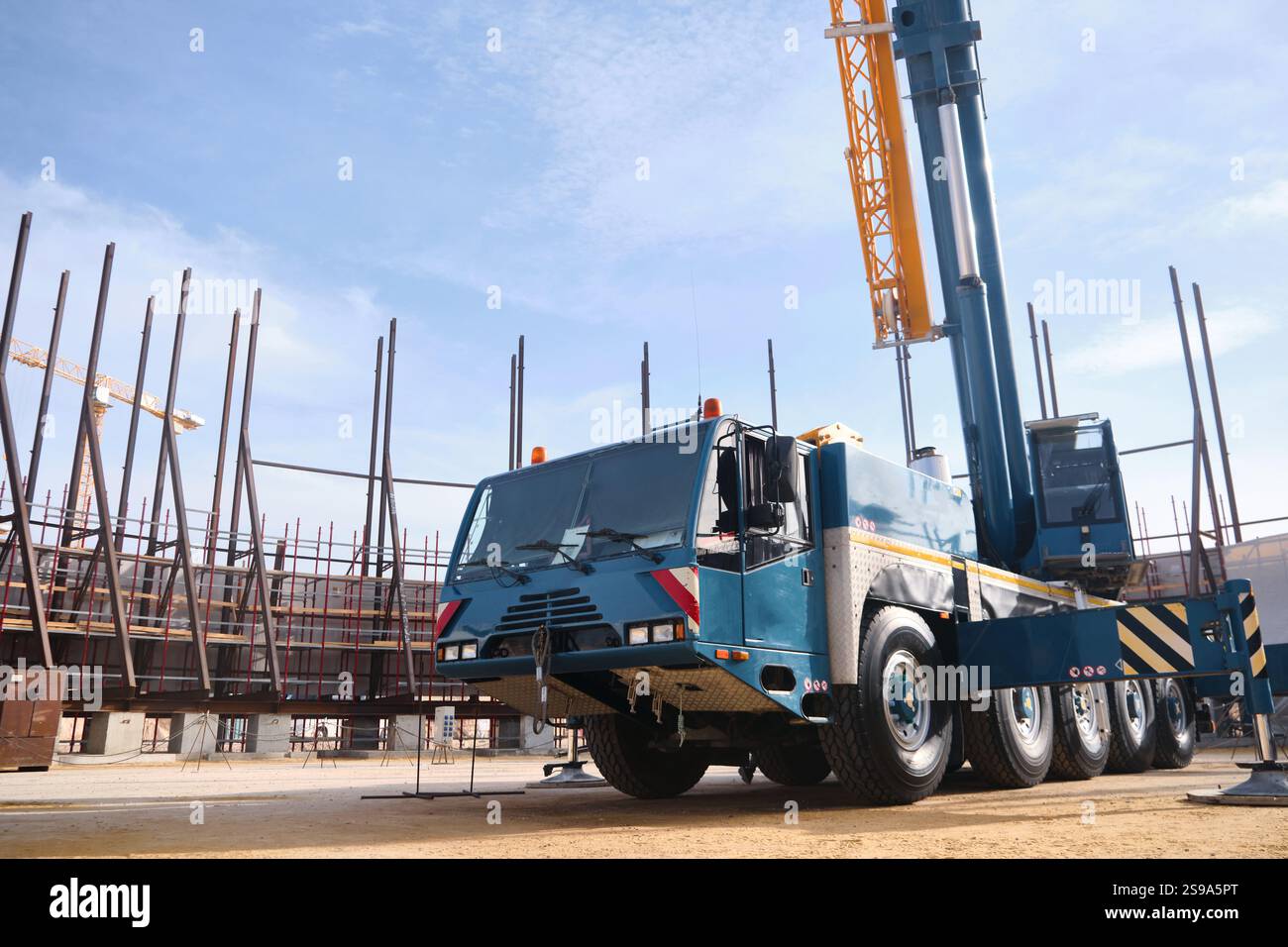 Yellow wheeled truck crane hi-res stock photography and images - Alamy