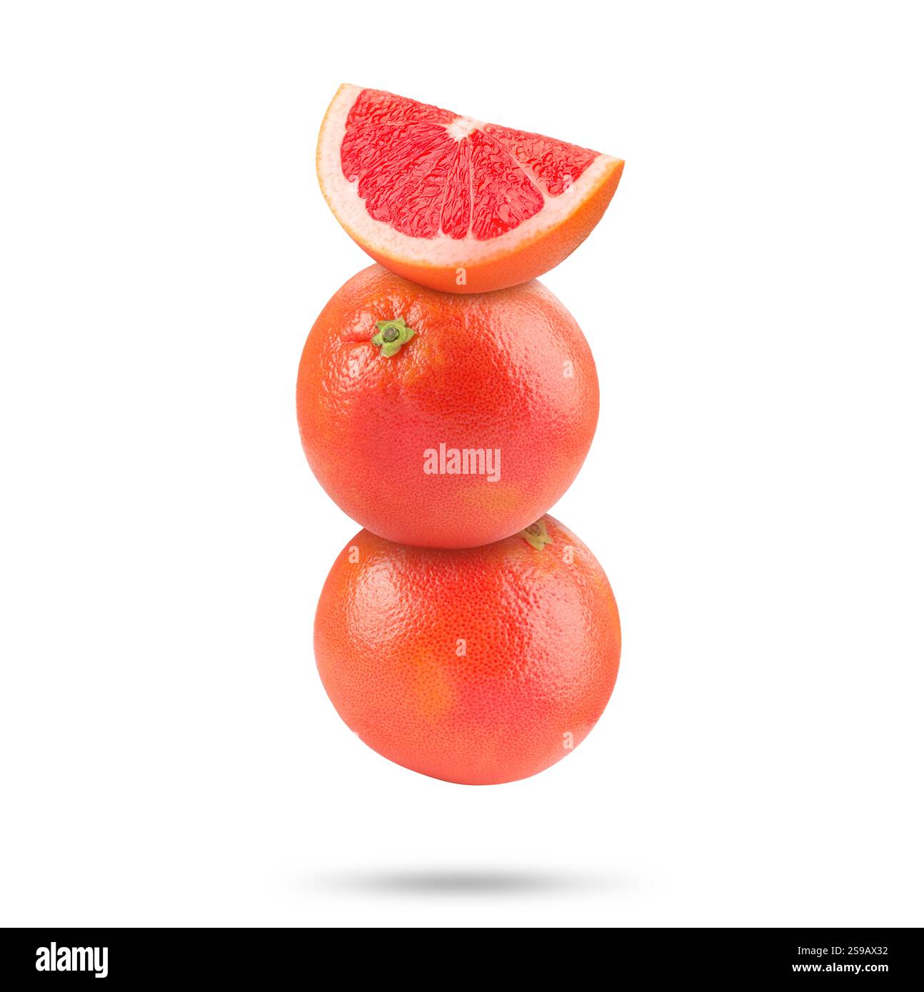 Fresh grapefruits in air on white background Stock Photo